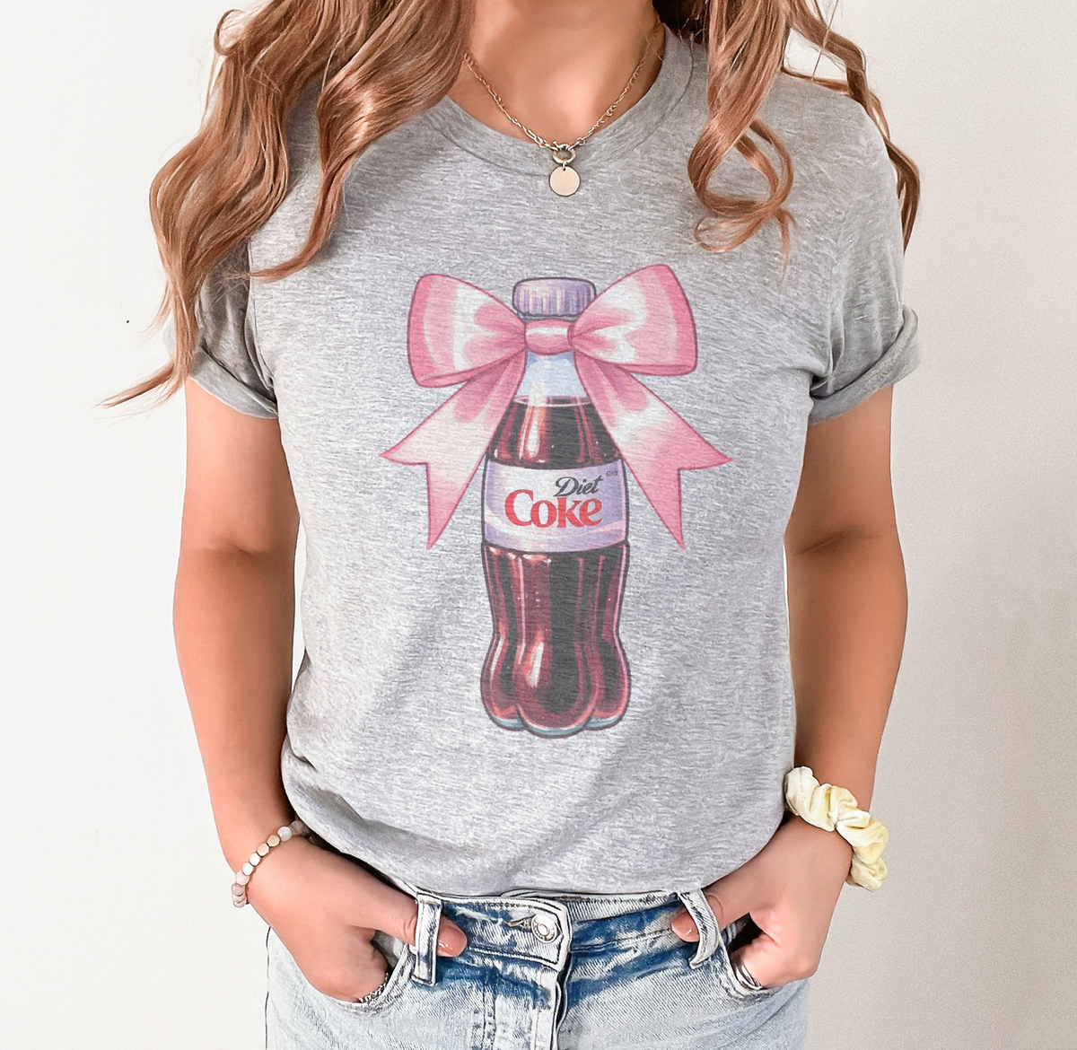 Pink Bow Diet Coke bottle valentine bow soda Graphic Tee: Peach / S